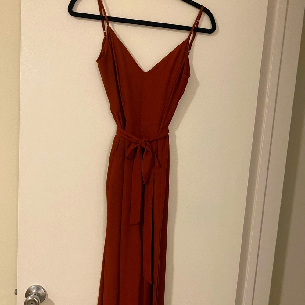 Jumpsuit, pants go all the way to floor